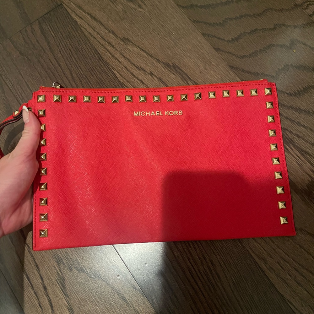 Like new Michael Kors Selma studded clutch